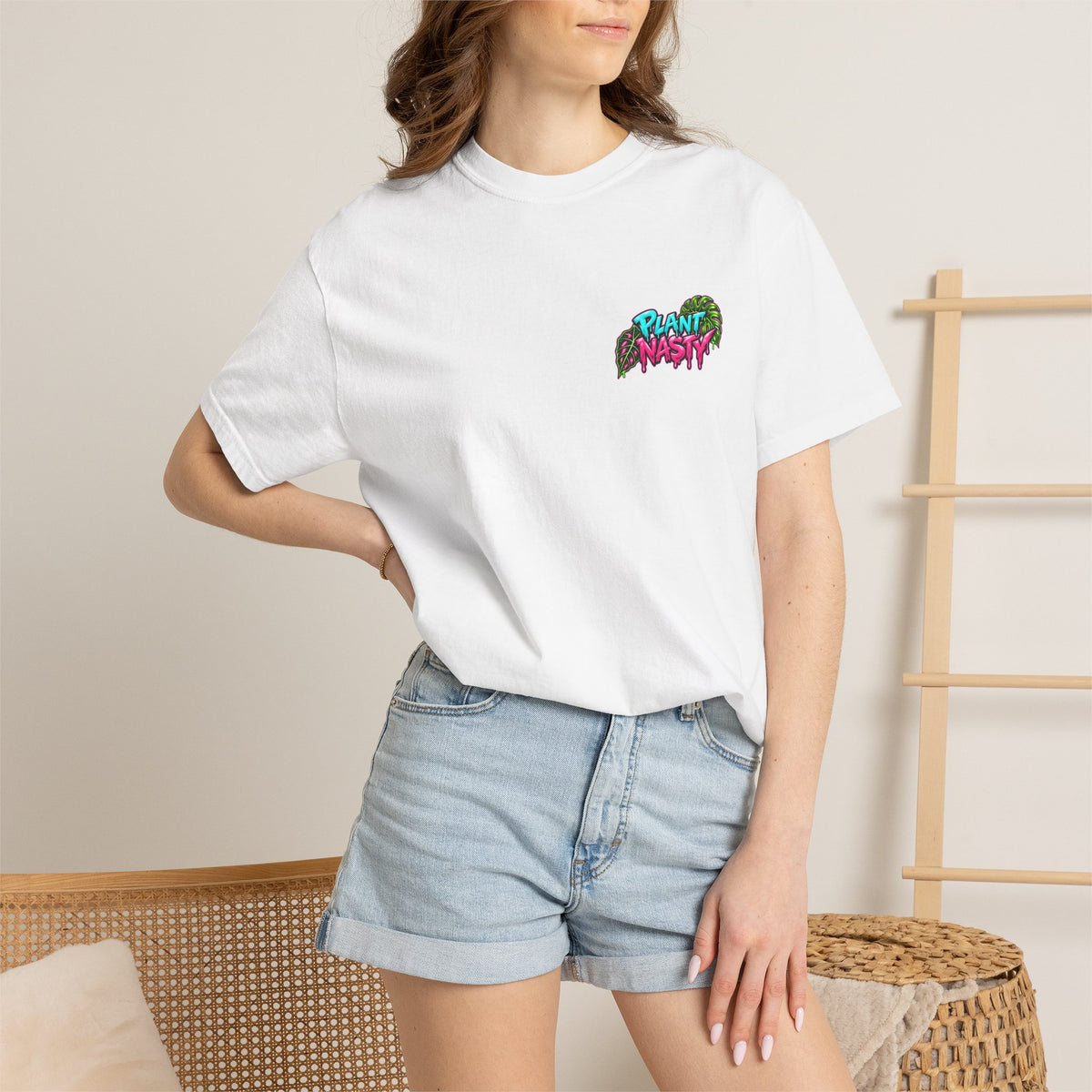 Plant Nasty Logo T-shirt featuring the OG Nasty Tee design, made by Printify, displayed on a casual black crew neck shirt.